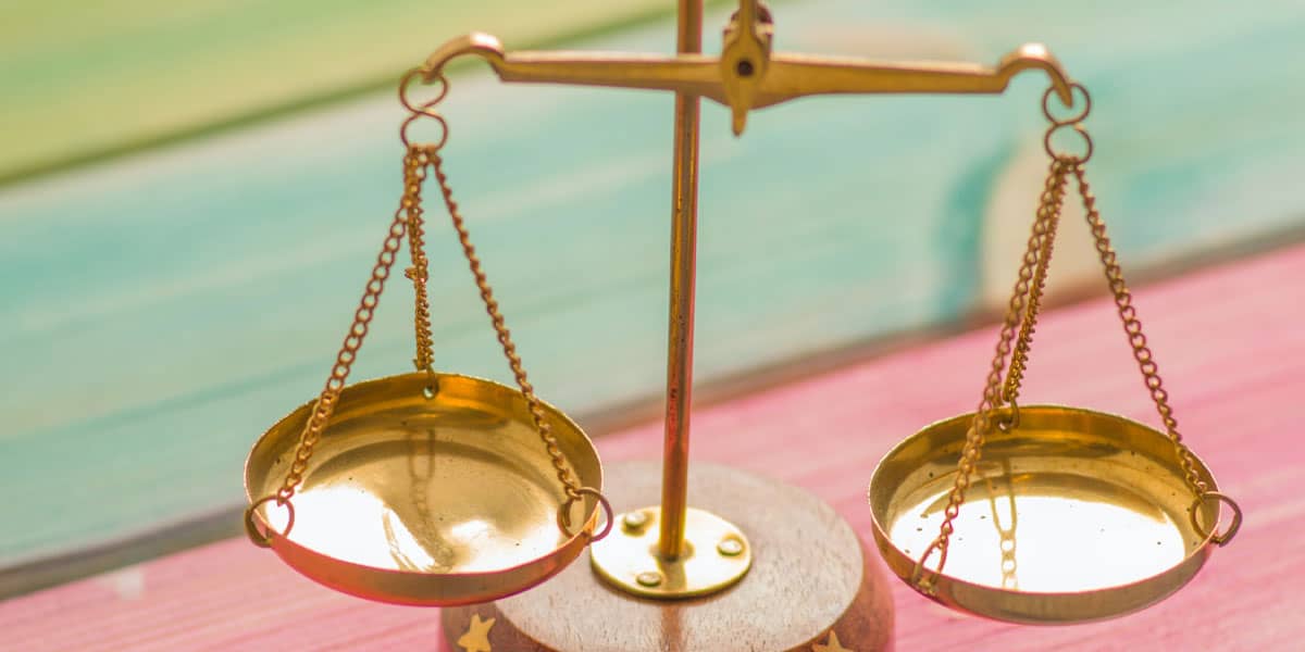 gold scales balanced