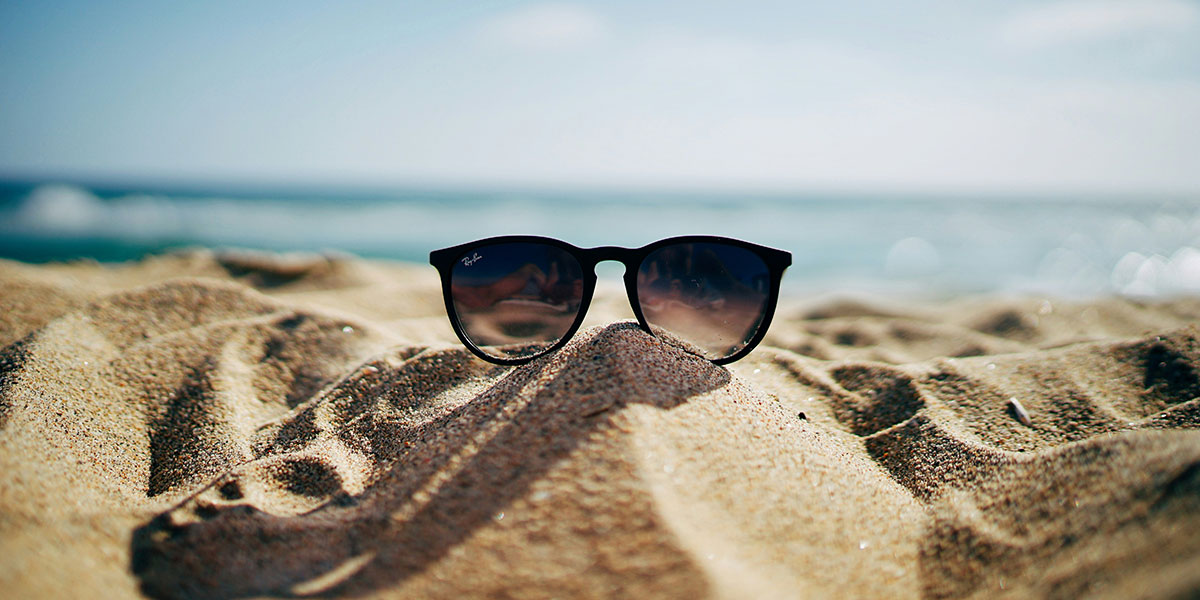 sunglasses and beach image to go with post during hot weather